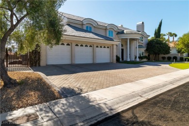 Discover luxury living in this quality-built, custom all-brick on Spanish Trail Golf and Country Club in Nevada - for sale on GolfHomes.com, golf home, golf lot