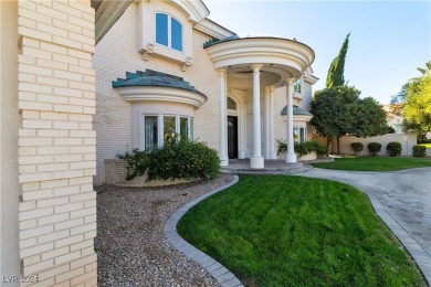 Discover luxury living in this quality-built, custom all-brick on Spanish Trail Golf and Country Club in Nevada - for sale on GolfHomes.com, golf home, golf lot