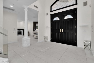 Discover luxury living in this quality-built, custom all-brick on Spanish Trail Golf and Country Club in Nevada - for sale on GolfHomes.com, golf home, golf lot