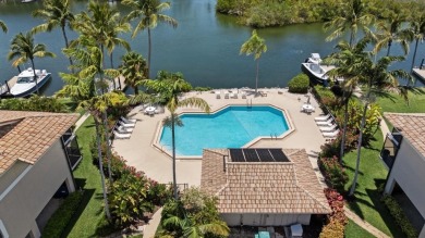 Top-Floor Spacious 3-Bedroom Condo with Dock  Water Views! on Card Sound Golf Club in Florida - for sale on GolfHomes.com, golf home, golf lot