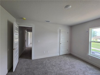 SELLER PROMO ON THIS POPULAR 1970 PLAN ON THE GOLF COURSE!! THIS on Twisted Oaks Golf Club in Florida - for sale on GolfHomes.com, golf home, golf lot