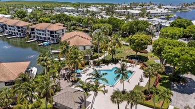 Top-Floor Spacious 3-Bedroom Condo with Dock  Water Views! on Card Sound Golf Club in Florida - for sale on GolfHomes.com, golf home, golf lot