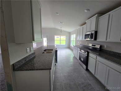 SELLER PROMO ON THIS POPULAR 1970 PLAN ON THE GOLF COURSE!! THIS on Twisted Oaks Golf Club in Florida - for sale on GolfHomes.com, golf home, golf lot
