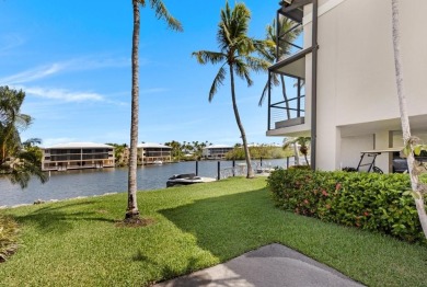 Top-Floor Spacious 3-Bedroom Condo with Dock  Water Views! on Card Sound Golf Club in Florida - for sale on GolfHomes.com, golf home, golf lot