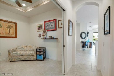 The home has 2 bedrooms, 2 baths, den and 2 stall garage. The on Royal Tee Country Club in Florida - for sale on GolfHomes.com, golf home, golf lot