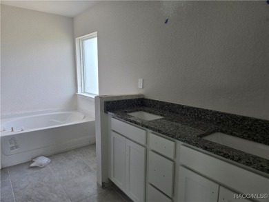 SELLER PROMO ON THIS POPULAR 1970 PLAN ON THE GOLF COURSE!! THIS on Twisted Oaks Golf Club in Florida - for sale on GolfHomes.com, golf home, golf lot