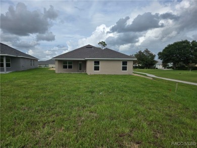 SELLER PROMO ON THIS POPULAR 1970 PLAN ON THE GOLF COURSE!! THIS on Twisted Oaks Golf Club in Florida - for sale on GolfHomes.com, golf home, golf lot