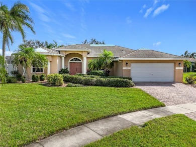 POOL HOME with LOW HOA FEE'S and no CDD.This home has the on The Golf Club of Cypress Creek in Florida - for sale on GolfHomes.com, golf home, golf lot