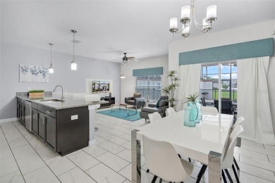 Step into the ultimate vacation lifestyle at 1578 Slice Way, a on The Oasis Club at Champions Gate in Florida - for sale on GolfHomes.com, golf home, golf lot