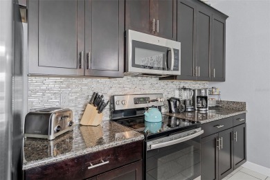 Step into the ultimate vacation lifestyle at 1578 Slice Way, a on The Oasis Club at Champions Gate in Florida - for sale on GolfHomes.com, golf home, golf lot