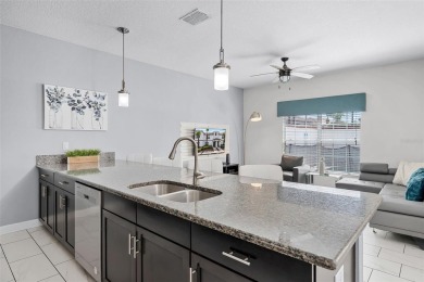 Step into the ultimate vacation lifestyle at 1578 Slice Way, a on The Oasis Club at Champions Gate in Florida - for sale on GolfHomes.com, golf home, golf lot