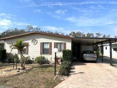 Enjoy stunning golf course views from this spacious 1,464 sq. ft on Crystal Lake Club in Florida - for sale on GolfHomes.com, golf home, golf lot