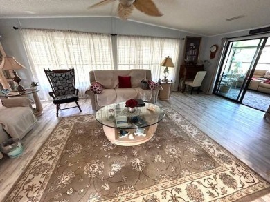 Enjoy stunning golf course views from this spacious 1,464 sq. ft on Crystal Lake Club in Florida - for sale on GolfHomes.com, golf home, golf lot