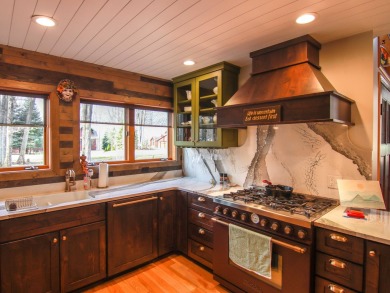 Peaceful and private, this entirely renovated home where no on Crystal Mountain Golf Course in Michigan - for sale on GolfHomes.com, golf home, golf lot