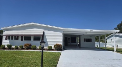 ZELLWOOD STATION Nicely renovated 3-bedroom 2 bath home, Move in on Zellwood Station Country Club in Florida - for sale on GolfHomes.com, golf home, golf lot
