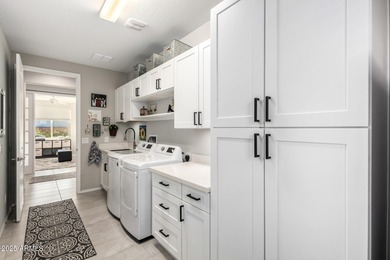 Experience luxury living and unforgettable Arizona evenings in on Copper Canyon Golf Club in Arizona - for sale on GolfHomes.com, golf home, golf lot