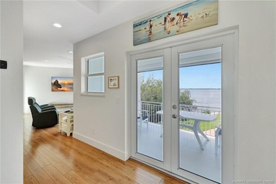 This stunning two-story custom-built home offers breathtaking on Island Dunes Country Club in Florida - for sale on GolfHomes.com, golf home, golf lot