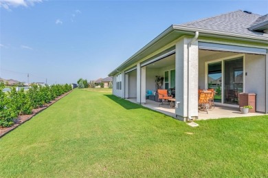 Discover this beautifully upgraded Larkspur model--better than on Wildhorse Golf Club of Robson Ranch in Texas - for sale on GolfHomes.com, golf home, golf lot