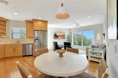 This stunning two-story custom-built home offers breathtaking on Island Dunes Country Club in Florida - for sale on GolfHomes.com, golf home, golf lot