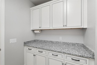 Discover this beautifully upgraded Larkspur model--better than on Wildhorse Golf Club of Robson Ranch in Texas - for sale on GolfHomes.com, golf home, golf lot