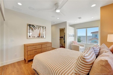 This stunning two-story custom-built home offers breathtaking on Island Dunes Country Club in Florida - for sale on GolfHomes.com, golf home, golf lot