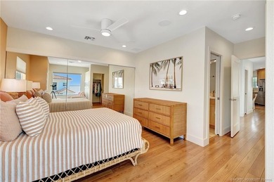 This stunning two-story custom-built home offers breathtaking on Island Dunes Country Club in Florida - for sale on GolfHomes.com, golf home, golf lot