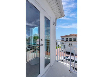 This stunning two-story custom-built home offers breathtaking on Island Dunes Country Club in Florida - for sale on GolfHomes.com, golf home, golf lot