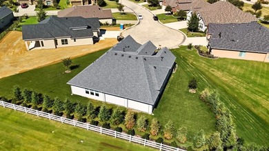 Discover this beautifully upgraded Larkspur model--better than on Wildhorse Golf Club of Robson Ranch in Texas - for sale on GolfHomes.com, golf home, golf lot