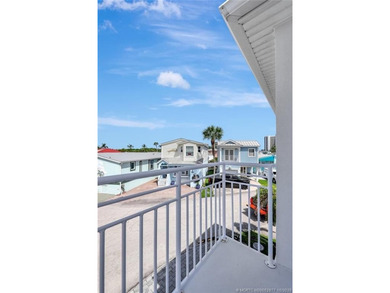 This stunning two-story custom-built home offers breathtaking on Island Dunes Country Club in Florida - for sale on GolfHomes.com, golf home, golf lot