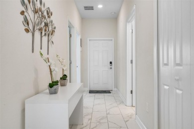 Get ready to fall in love with this fully furnished 5-bedroom on The Oasis Club at Champions Gate in Florida - for sale on GolfHomes.com, golf home, golf lot
