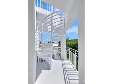 This stunning two-story custom-built home offers breathtaking on Island Dunes Country Club in Florida - for sale on GolfHomes.com, golf home, golf lot