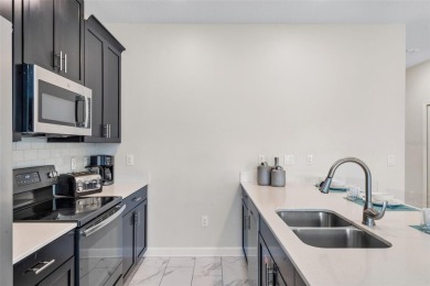 Get ready to fall in love with this fully furnished 5-bedroom on The Oasis Club at Champions Gate in Florida - for sale on GolfHomes.com, golf home, golf lot