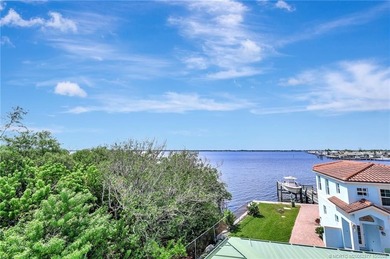 This stunning two-story custom-built home offers breathtaking on Island Dunes Country Club in Florida - for sale on GolfHomes.com, golf home, golf lot