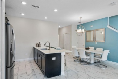 Get ready to fall in love with this fully furnished 5-bedroom on The Oasis Club at Champions Gate in Florida - for sale on GolfHomes.com, golf home, golf lot