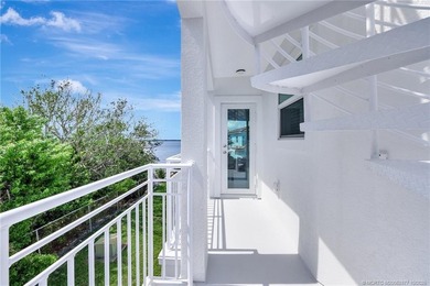 This stunning two-story custom-built home offers breathtaking on Island Dunes Country Club in Florida - for sale on GolfHomes.com, golf home, golf lot