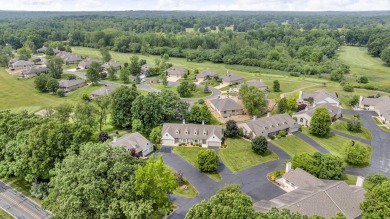 CONTEMPORARY SUMMIT TOWNSHIP END-UNIT CONDO FEATURING MAIN FLOOR on Country Club of Jackson in Michigan - for sale on GolfHomes.com, golf home, golf lot