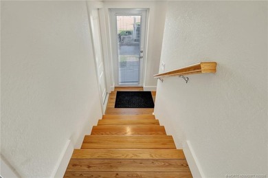 This stunning two-story custom-built home offers breathtaking on Island Dunes Country Club in Florida - for sale on GolfHomes.com, golf home, golf lot