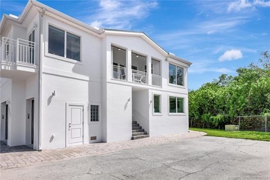This stunning two-story custom-built home offers breathtaking on Island Dunes Country Club in Florida - for sale on GolfHomes.com, golf home, golf lot