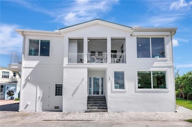 This stunning two-story custom-built home offers breathtaking on Island Dunes Country Club in Florida - for sale on GolfHomes.com, golf home, golf lot