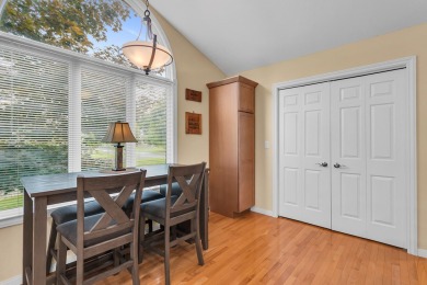 CONTEMPORARY SUMMIT TOWNSHIP END-UNIT CONDO FEATURING MAIN FLOOR on Country Club of Jackson in Michigan - for sale on GolfHomes.com, golf home, golf lot