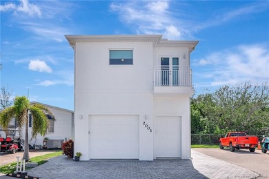 This stunning two-story custom-built home offers breathtaking on Island Dunes Country Club in Florida - for sale on GolfHomes.com, golf home, golf lot