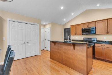 CONTEMPORARY SUMMIT TOWNSHIP END-UNIT CONDO FEATURING MAIN FLOOR on Country Club of Jackson in Michigan - for sale on GolfHomes.com, golf home, golf lot