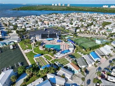 This stunning two-story custom-built home offers breathtaking on Island Dunes Country Club in Florida - for sale on GolfHomes.com, golf home, golf lot