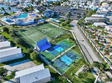 This stunning two-story custom-built home offers breathtaking on Island Dunes Country Club in Florida - for sale on GolfHomes.com, golf home, golf lot