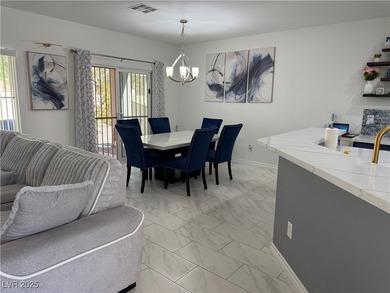 Enjoy your morning coffee from this beautiful courtyard on the on Aliante Golf Club in Nevada - for sale on GolfHomes.com, golf home, golf lot