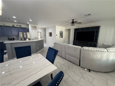 Enjoy your morning coffee from this beautiful courtyard on the on Aliante Golf Club in Nevada - for sale on GolfHomes.com, golf home, golf lot