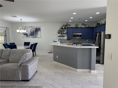 Enjoy your morning coffee from this beautiful courtyard on the on Aliante Golf Club in Nevada - for sale on GolfHomes.com, golf home, golf lot