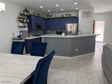 Enjoy your morning coffee from this beautiful courtyard on the on Aliante Golf Club in Nevada - for sale on GolfHomes.com, golf home, golf lot