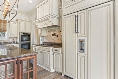 Discreetly positioned at the end of a quiet cul-de-sac, this on Myrtlewood Golf Course and Club  in South Carolina - for sale on GolfHomes.com, golf home, golf lot