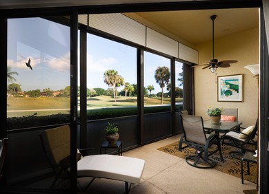 Set along the picturesque fairways of PGA National, this on PGA National Golf Club in Florida - for sale on GolfHomes.com, golf home, golf lot